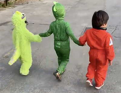Dressed-up kids: monster, gecko and astronaut
